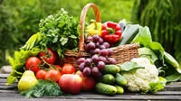 Basket filled with fresh vegetables and fruit