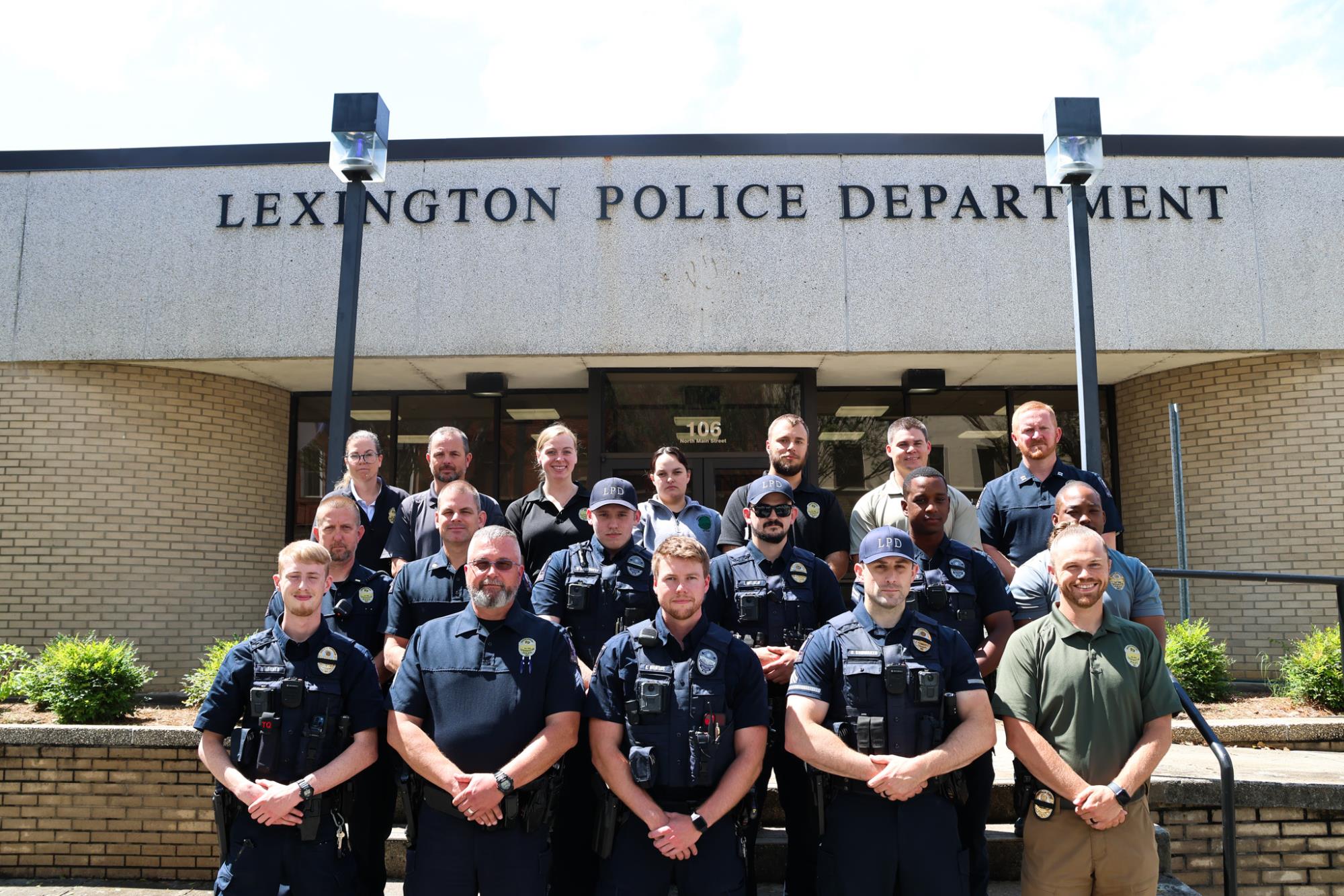 18 LPD Officers Outside of the Lexington Police Department on Main Street In Lexington, NC